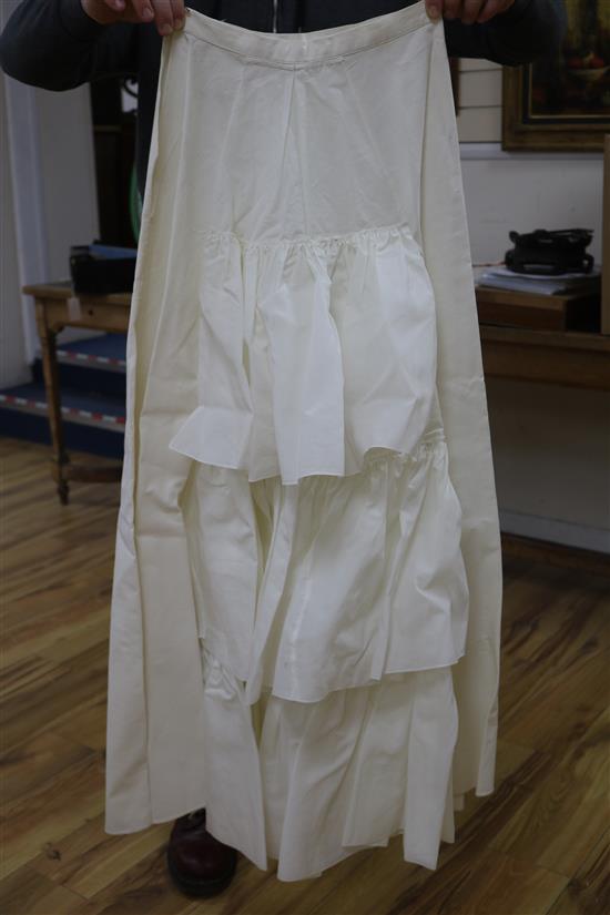 A lace 1940s-50s wedding dress and a skirt